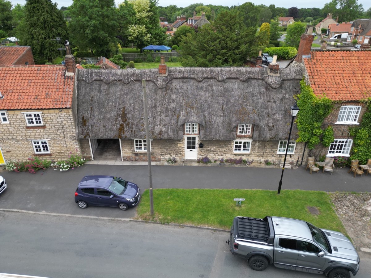 Grade II listed Thatch Cottage in Old Malton viewed during drone survey