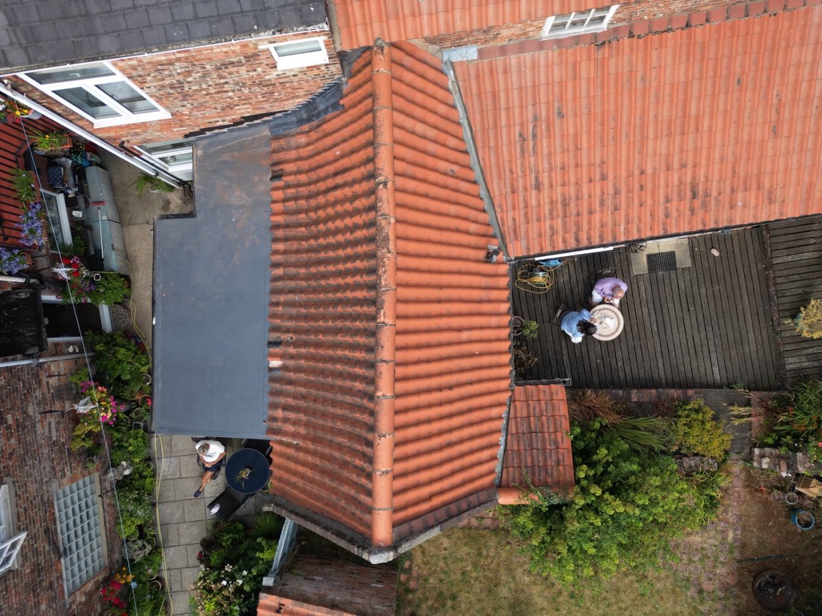 Clay pantile roof and ridge detailing